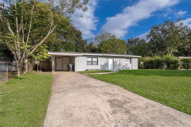 front view of a house with a yard