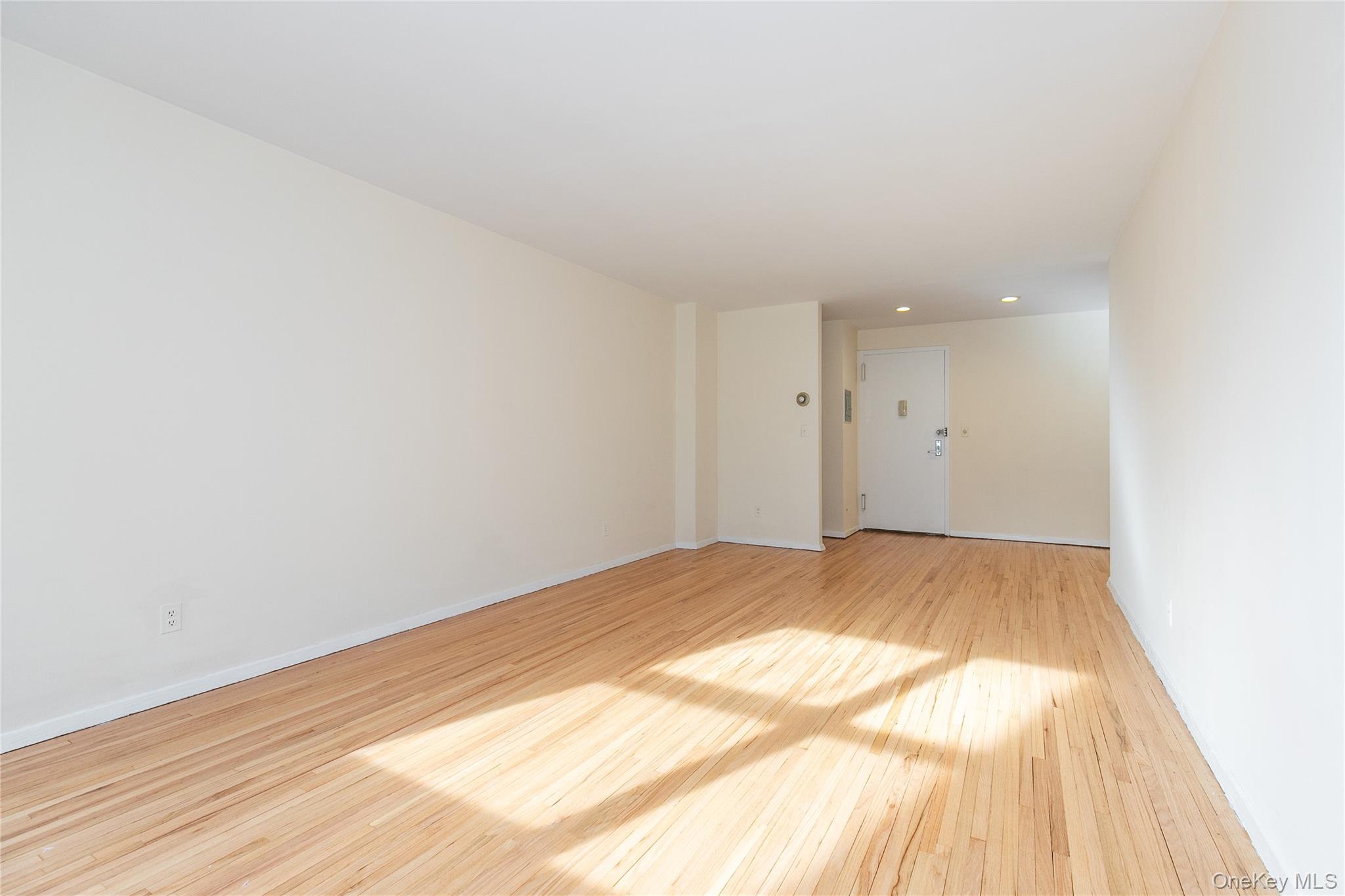 25 Park Place, Unit 2G Great Neck, NY 11021 - Photo 8 of 20 a view of empty room