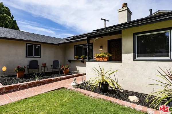 a front view of house with yard