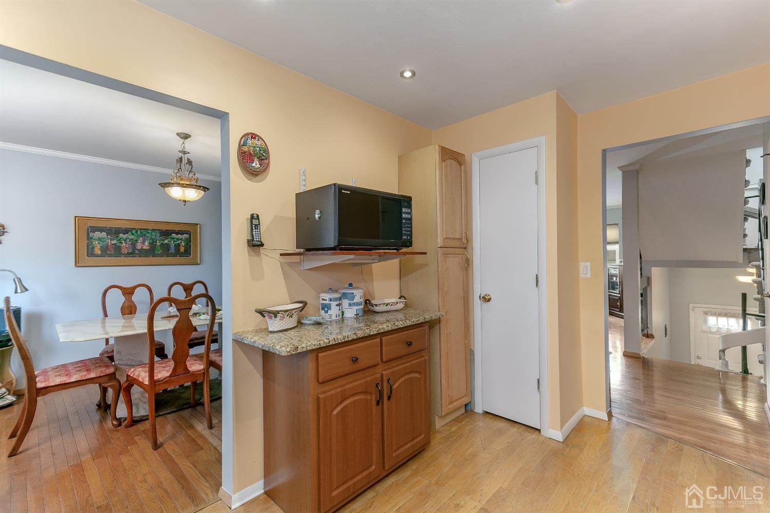 7303 Hana Road Edison, NJ 08817 - Photo 13 of 24 a view of a kitchen and dining room