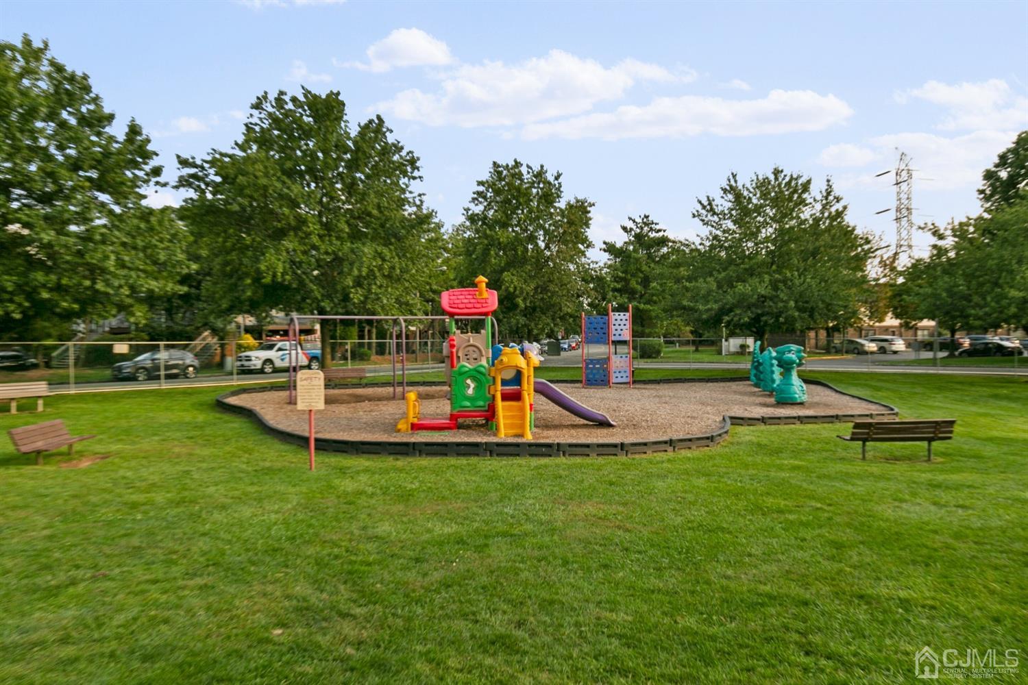 7303 Hana Road Edison, NJ 08817 - Photo 22 of 24 a view of a park with slide