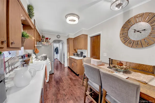 a very nice looking dining room with a large window