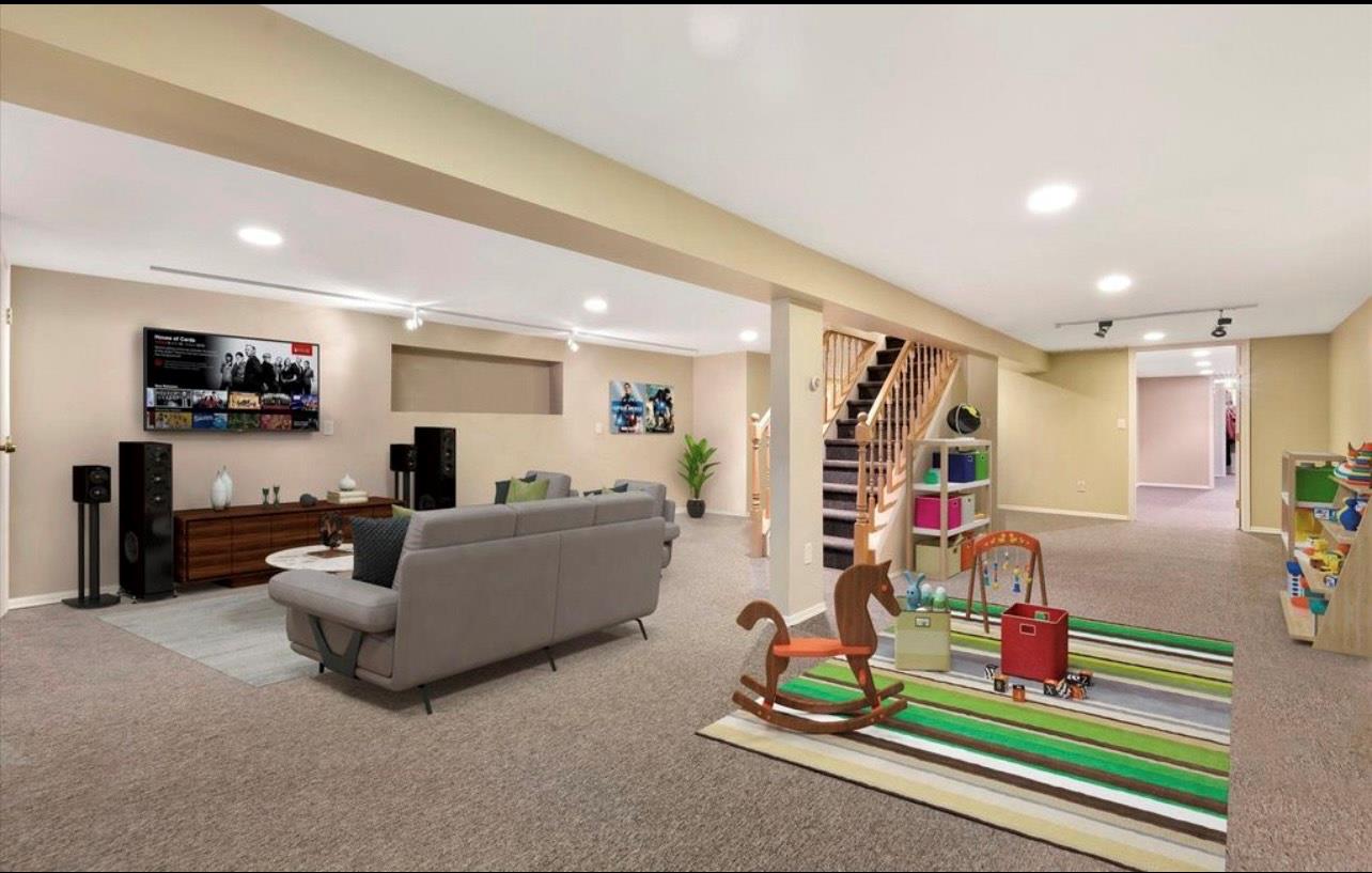 240 Plainview Road Woodbury, NY 11797 - Photo 13 of 22 a living room with furniture and white walls