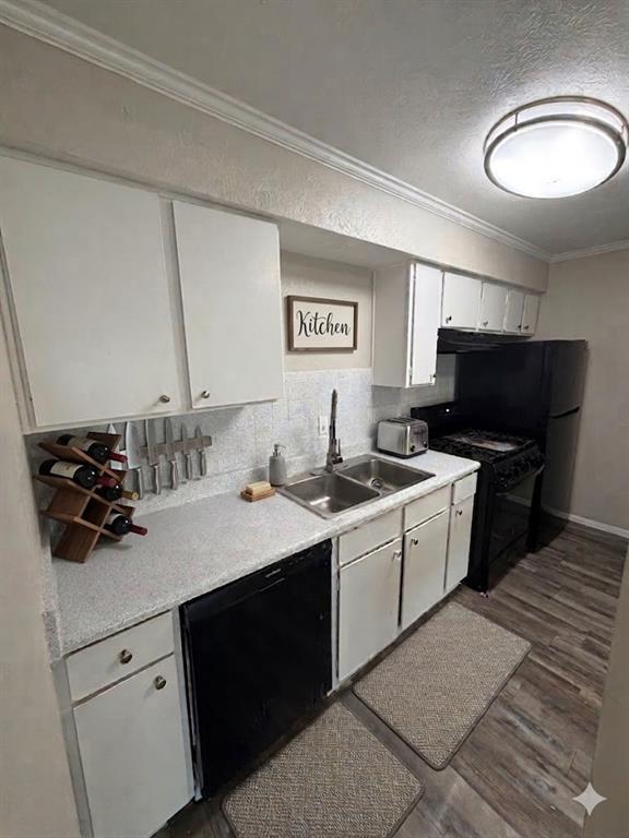 11457 Dennis Road, Unit 301 Dallas, TX 75229 - Photo 4 of 6 a kitchen with a sink appliances and cabinets