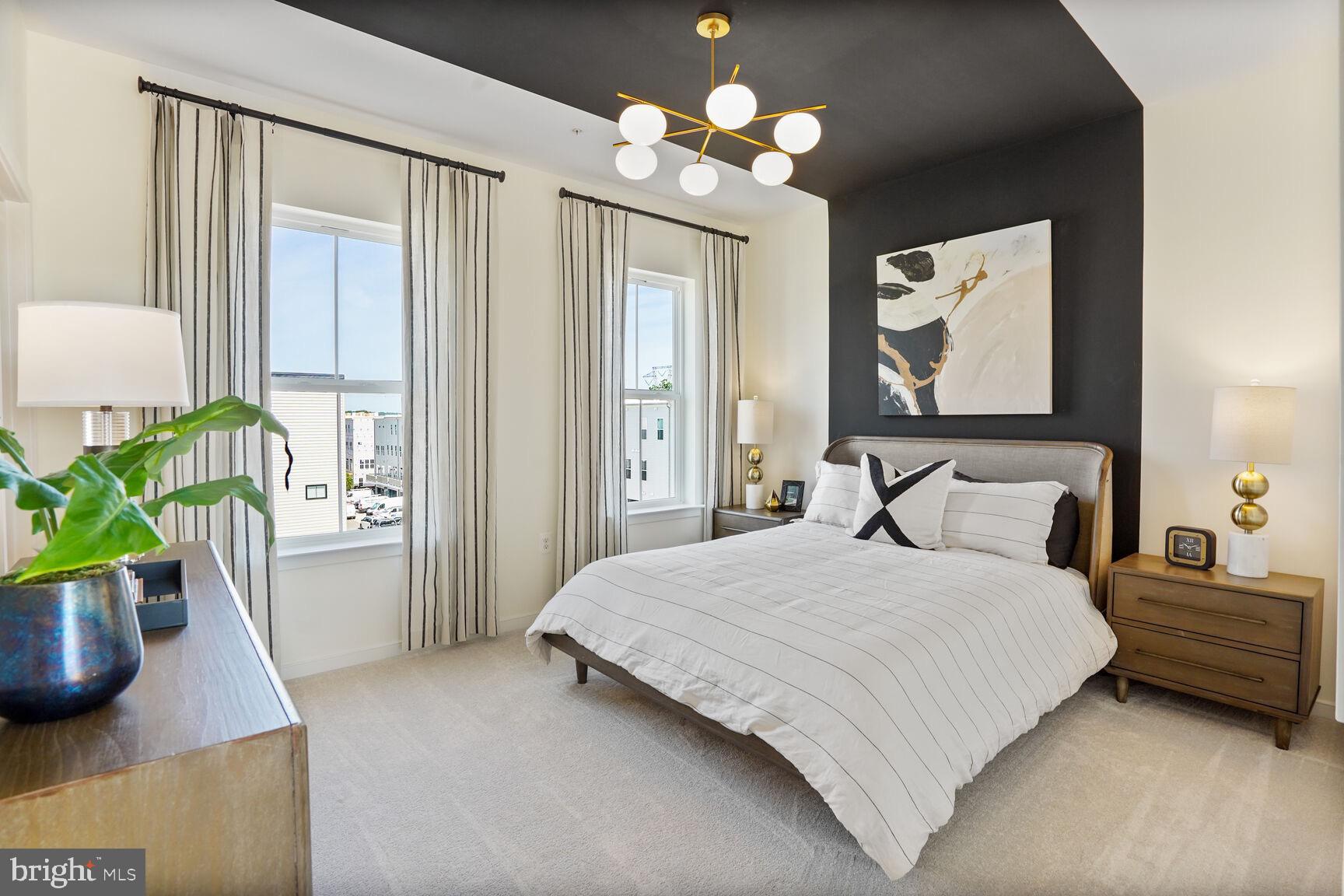 42116 Hazel Grv Terrace Ashburn, VA 20148 - Photo 6 of 21 a bedroom with a bed potted plant on dresser and a window