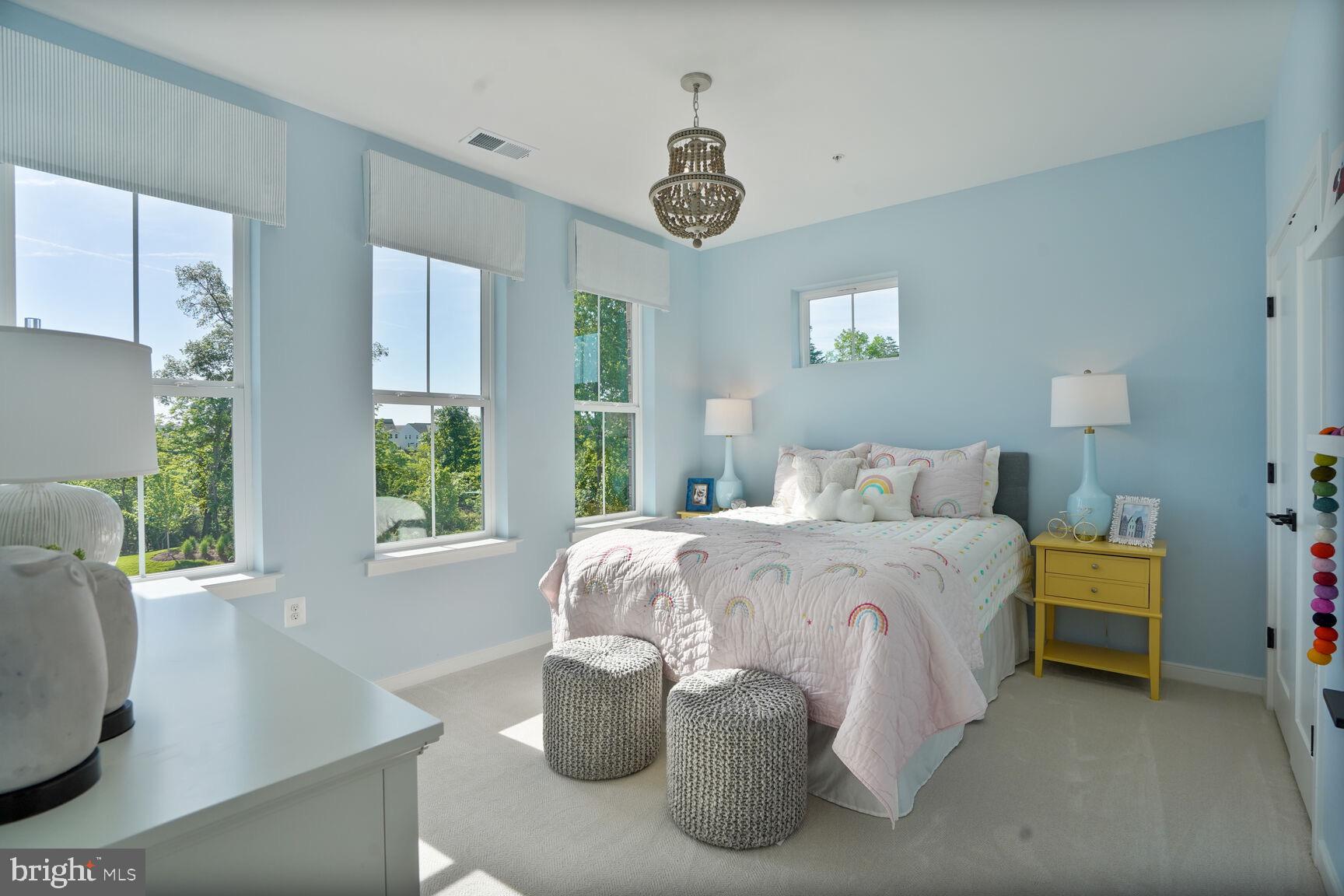 42116 Hazel Grv Terrace Ashburn, VA 20148 - Photo 7 of 21 a bedroom with a bed and a window