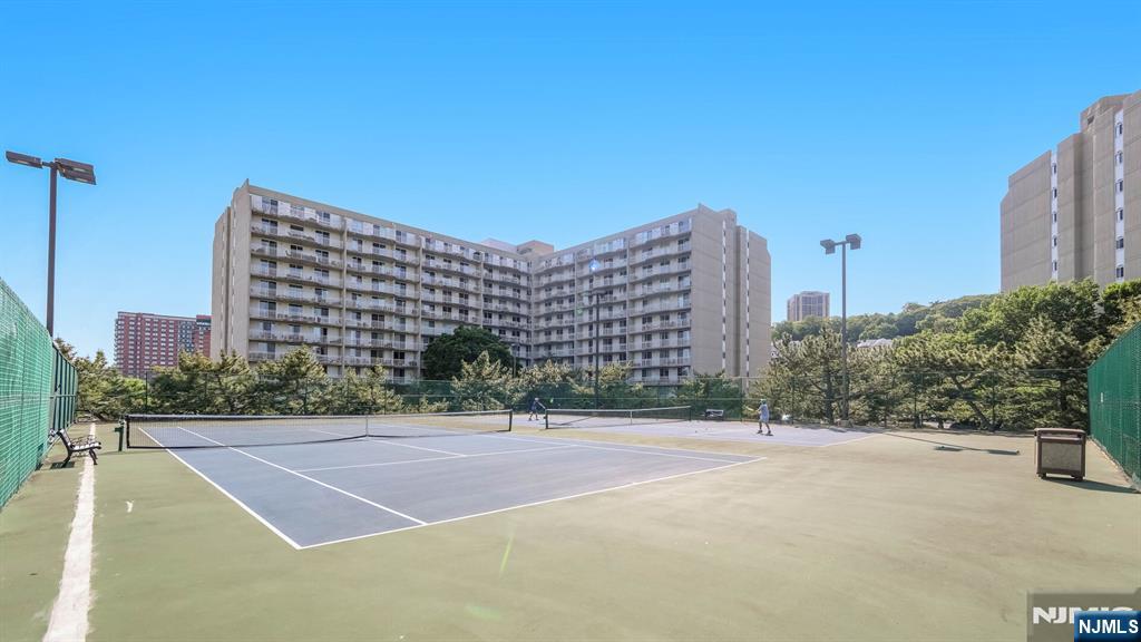 1077 River Road, Unit TH5 Edgewater, NJ 07020 - Photo 21 of 22 a building view with a outdoor space