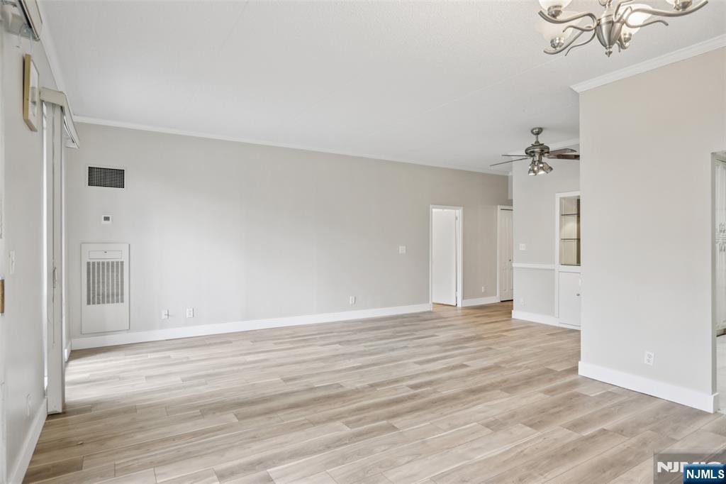 1077 River Road, Unit TH5 Edgewater, NJ 07020 - Photo 5 of 22 a view of an empty room with a window