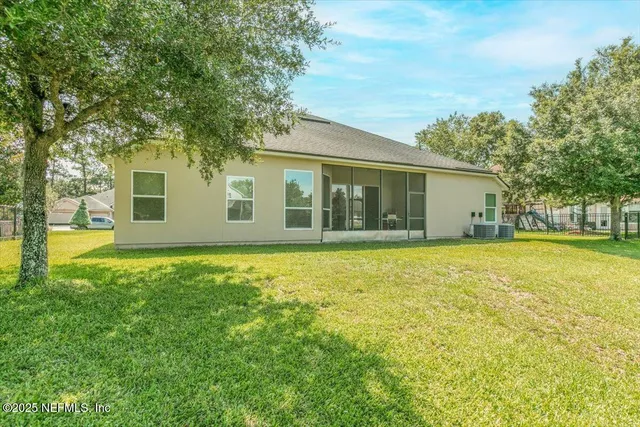 a view of a golf course with a lake