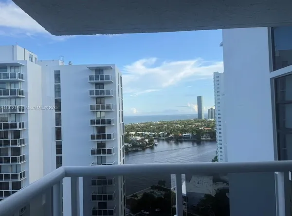 a view of balcony with furniture