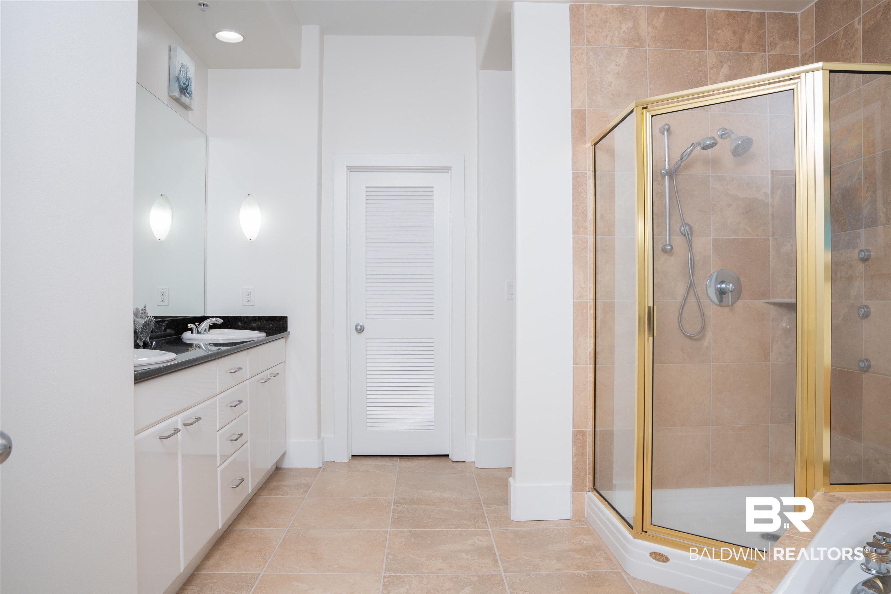 28107 Perdido Beach Boulevard, Unit DPH05 Orange Beach, AL 36561 - Photo 12 of 43 Bathroom with a stall shower, double vanity, and light tile patterned floors
