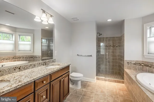 a view of a hallway with chandelier