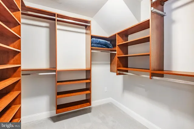 a view of a hallway with seating area