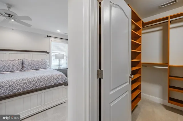 a view of a room with window and cabinet