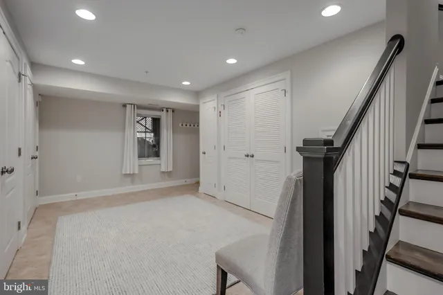 a view of a chairs and table in the balcony