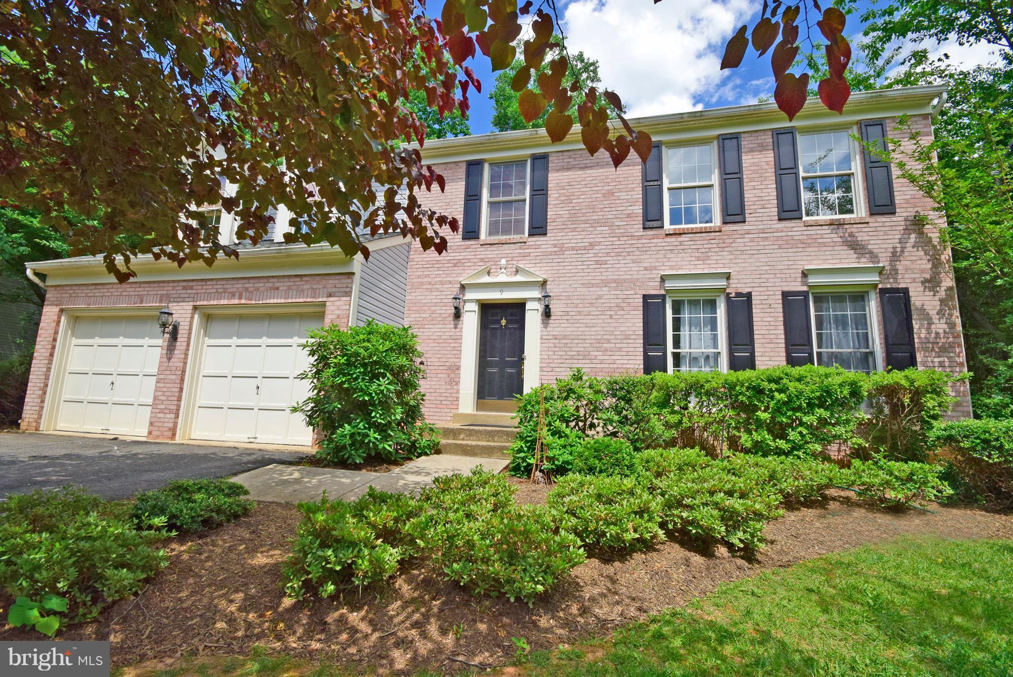9 Charleston Court Stafford, VA 22554 - Photo 2 of 30 front view of a house with a yard
