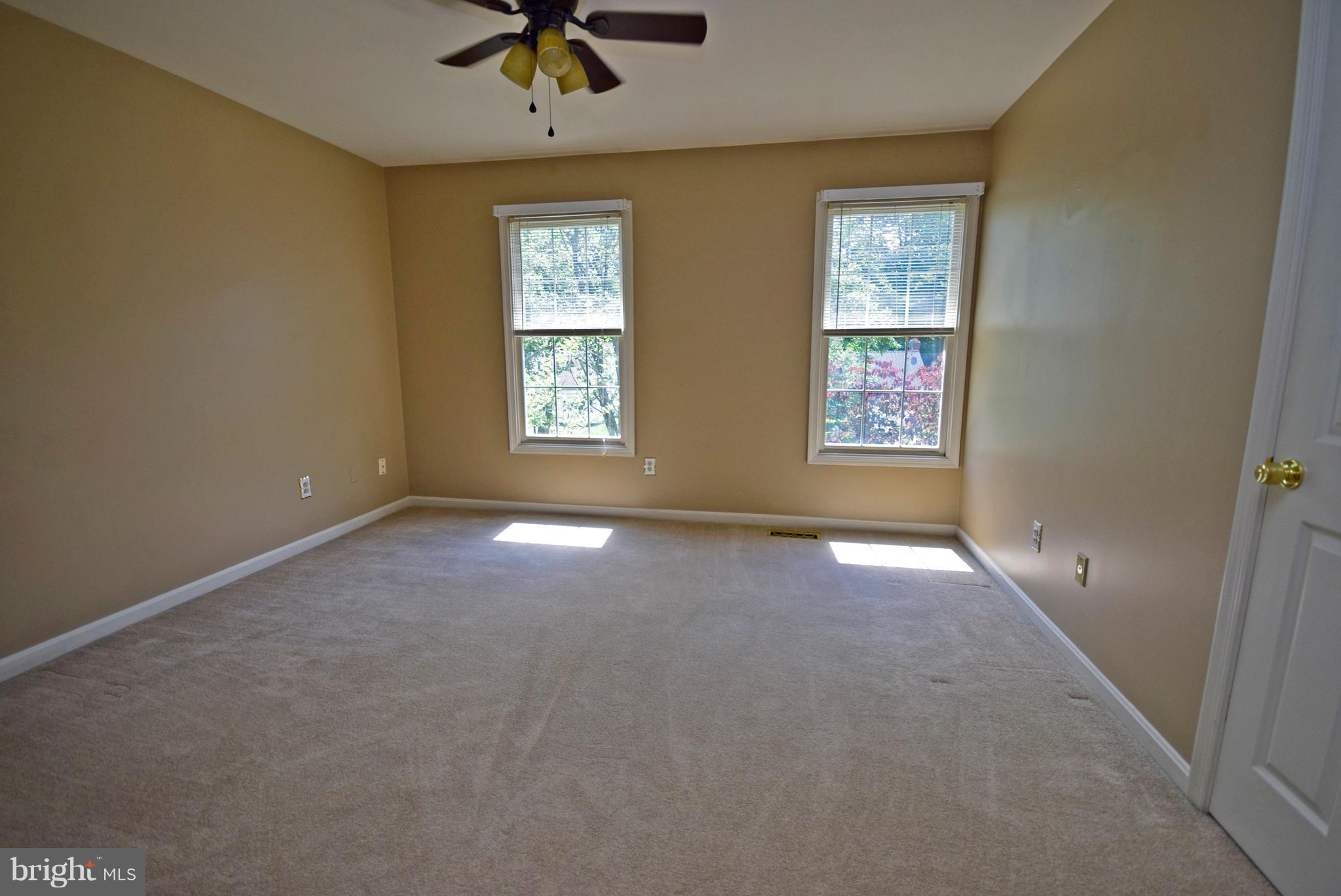 9 Charleston Court Stafford, VA 22554 - Photo 16 of 30 an empty room with windows and fan