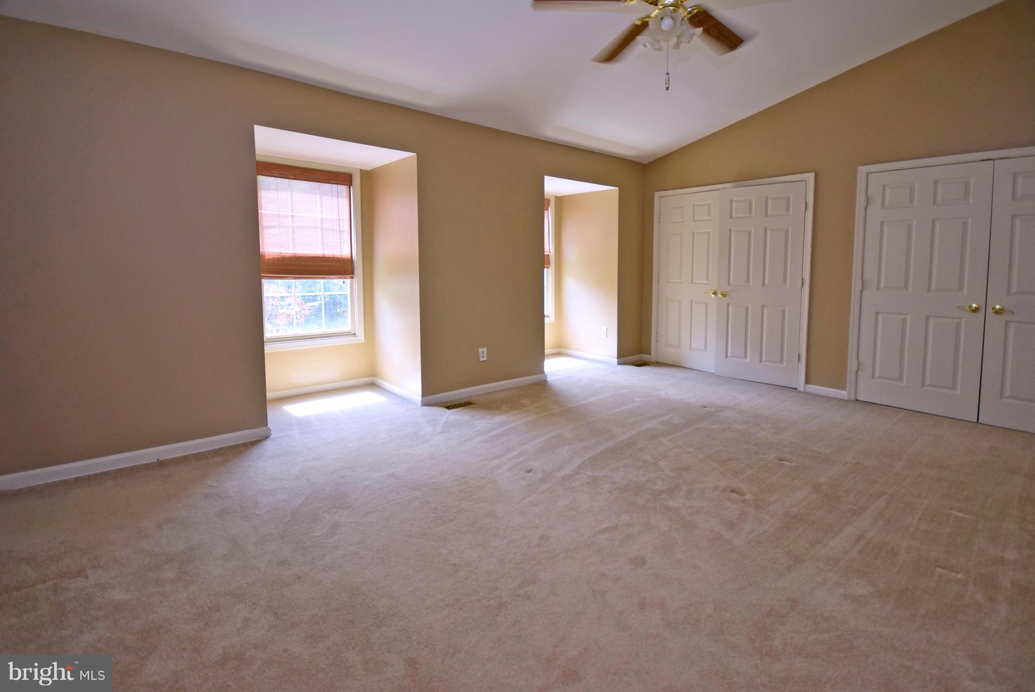 9 Charleston Court Stafford, VA 22554 - Photo 20 of 30 wooden floor and windows in an empty room