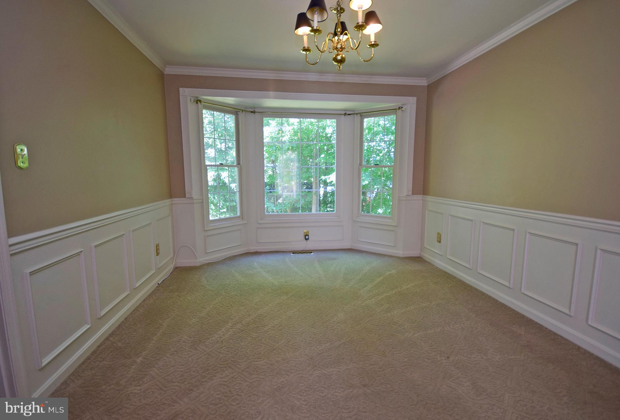 9 Charleston Court Stafford, VA 22554 - Photo 8 of 30 a view of an empty room with a window