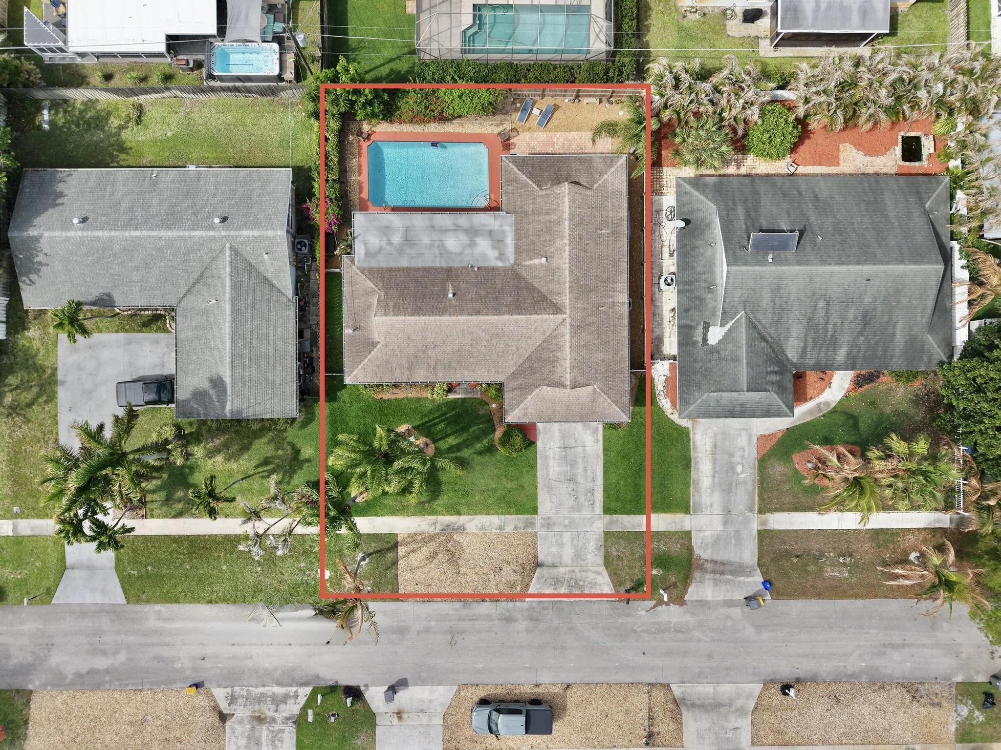 4167 Russell Street Jupiter, FL 33469 - Photo 48 of 60 an aerial view of a house with a garden and covered with wooden fence