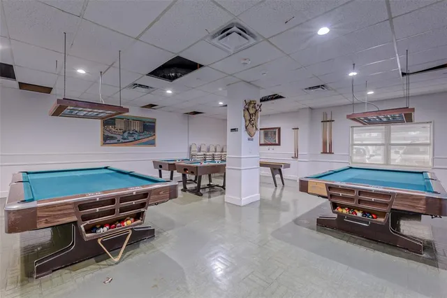 a view of a livingroom with couch and a large window