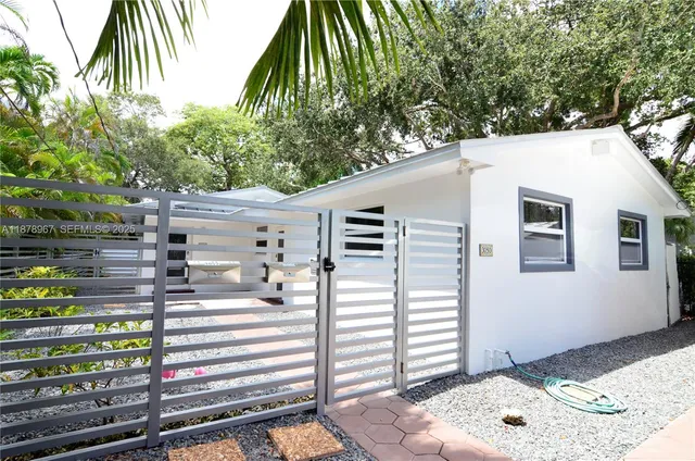 a bathroom with a toilet a sink and a shower