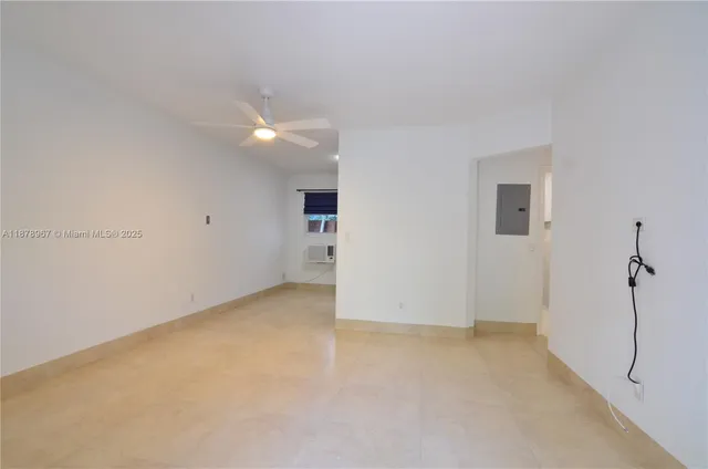 a view of a room with an empty space