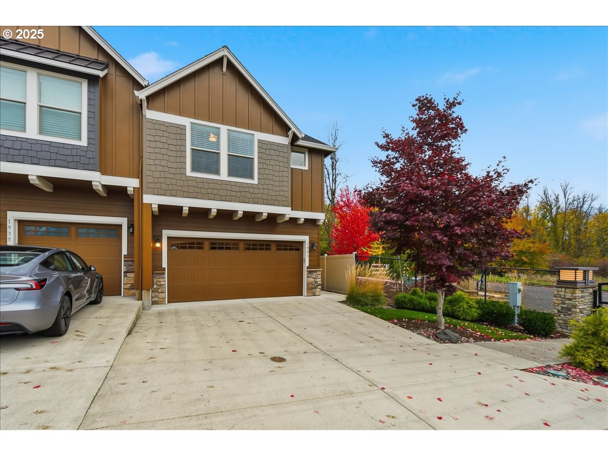 1941 Northwest Sage Street Camas, WA 98607 - Photo 1 of 29 a front view of a house with a garage