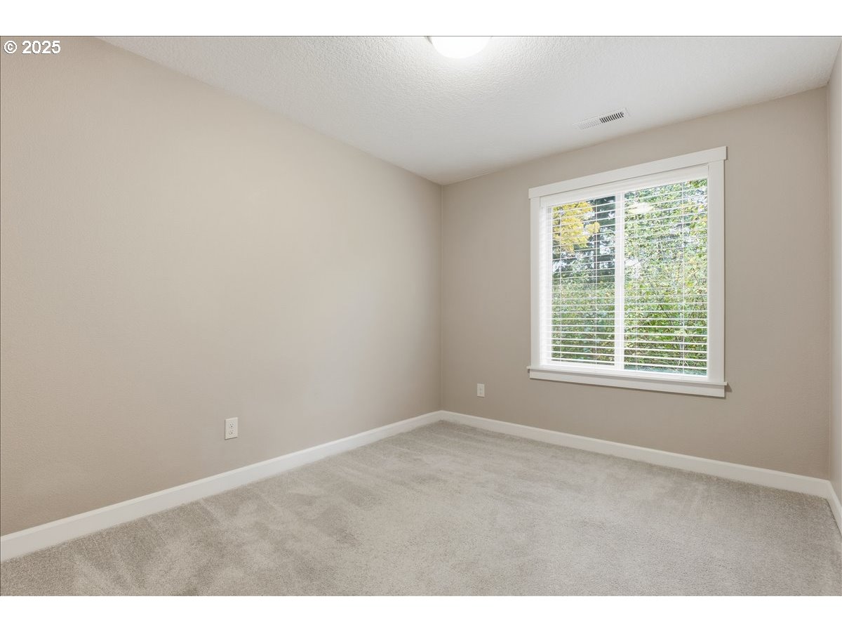 1941 Northwest Sage Street Camas, WA 98607 - Photo 21 of 29 a view of an empty room with a window
