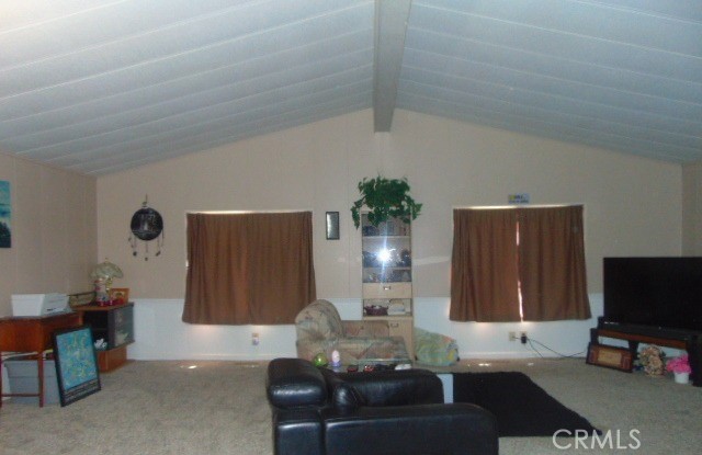 3835 Gardiner Ferry Road, Unit 36 Corning, CA 96021 - Photo 11 of 43 a living room with furniture and a flat screen tv