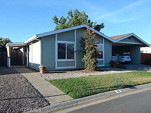 3835 Gardiner Ferry Road, Unit 36 Corning, CA 96021 - Photo 2 of 43 a front view of a house with a yard