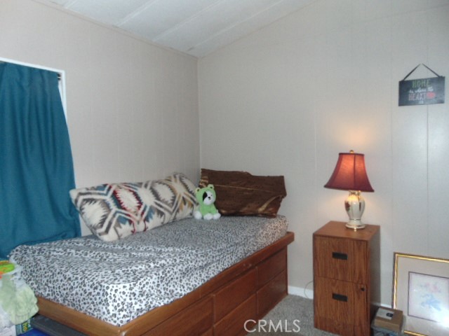 3835 Gardiner Ferry Road, Unit 36 Corning, CA 96021 - Photo 23 of 43 a living room with furniture and a lamp