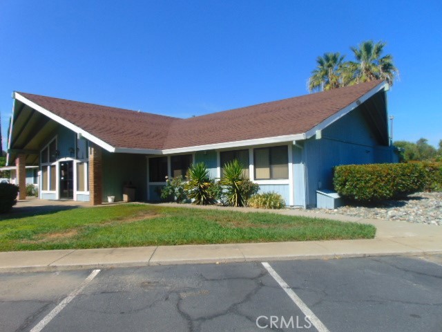 3835 Gardiner Ferry Road, Unit 36 Corning, CA 96021 - Photo 36 of 43 a front view of a house with a yard