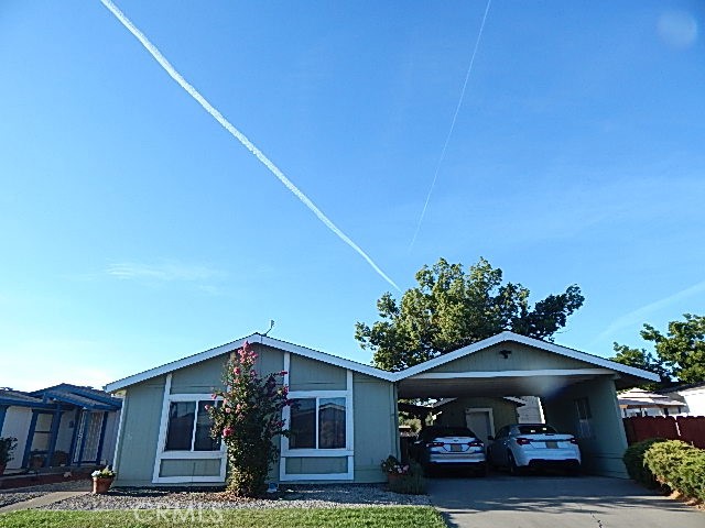 3835 Gardiner Ferry Road, Unit 36 Corning, CA 96021 - Photo 7 of 43 a front view of a house with garden
