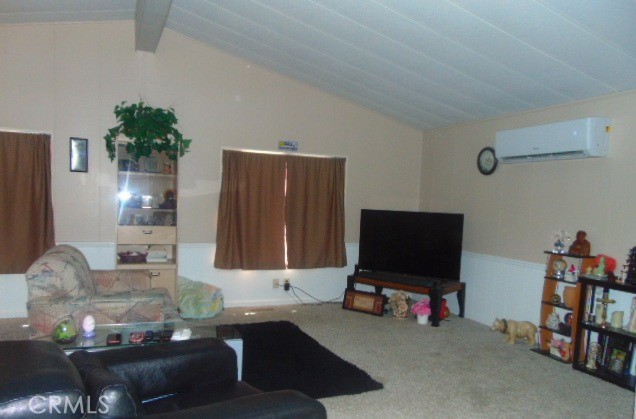 3835 Gardiner Ferry Road, Unit 36 Corning, CA 96021 - Photo 10 of 43 a living room with furniture and a flat screen tv