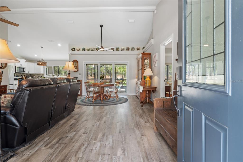 12929 Southwest 89th Street Dunnellon, FL 34432 - Photo 6 of 76 a view of a living room and dining room