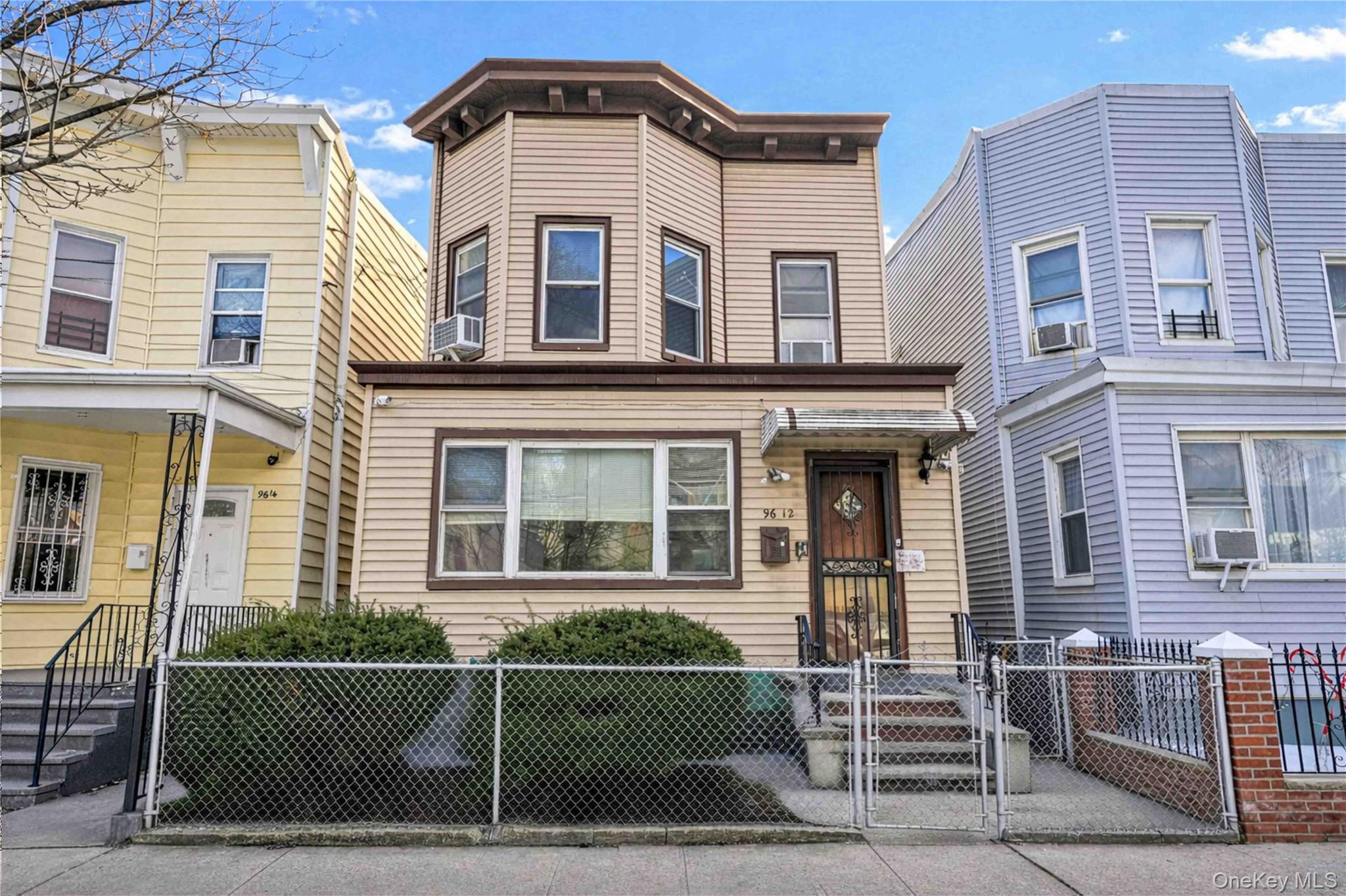 96-12 34th Avenue Queens, NY 11368 - Photo 1 of 35 front view of a house