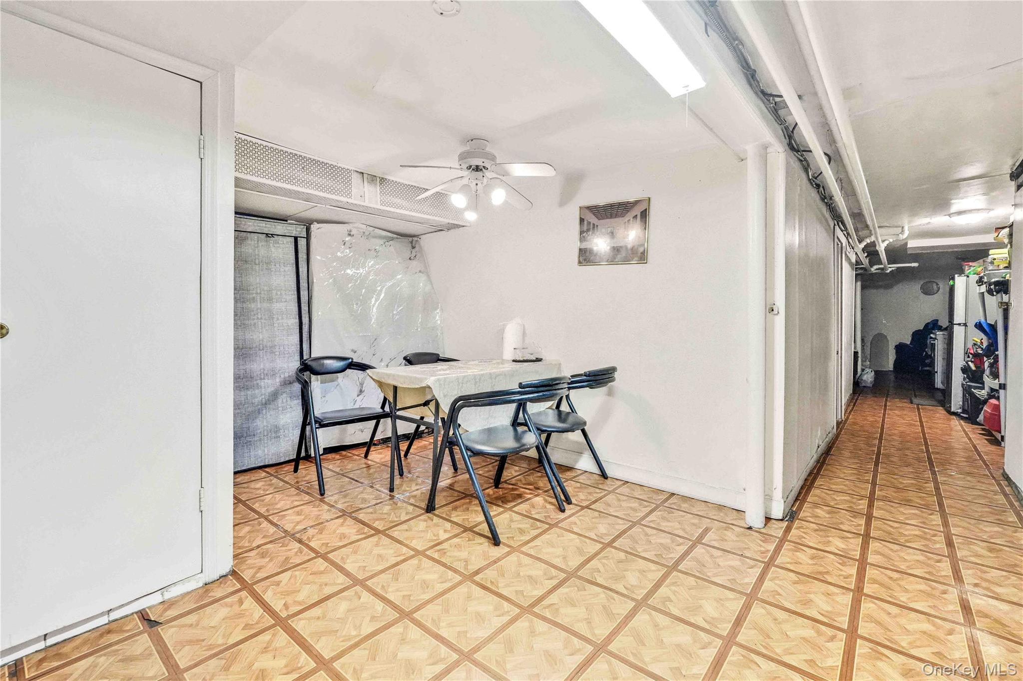 96-12 34th Avenue Queens, NY 11368 - Photo 24 of 35 a view of a dining room with furniture and a rug