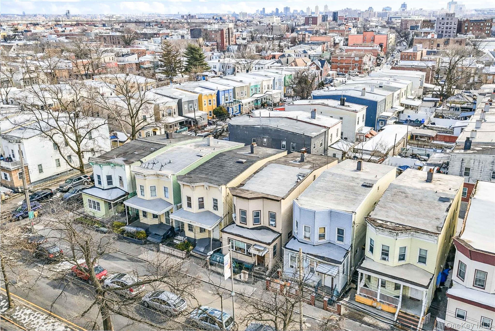 96-12 34th Avenue Queens, NY 11368 - Photo 33 of 35 an aerial view of a residential apartment building with a yard