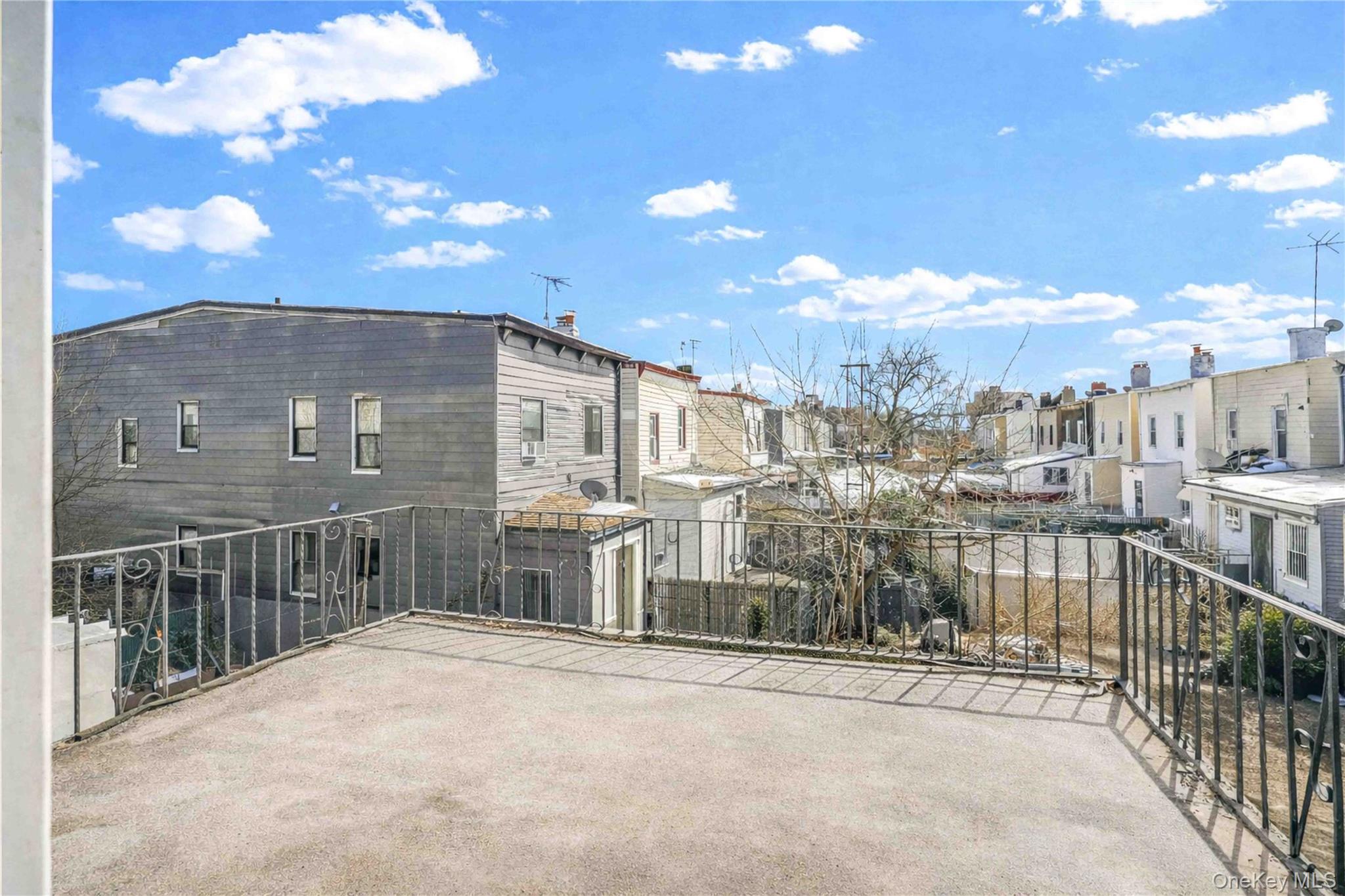 96-12 34th Avenue Queens, NY 11368 - Photo 8 of 35 a view of a building with a outdoor space