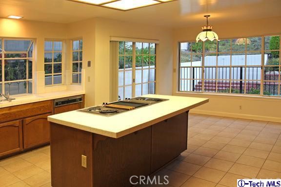 849 Moorside Drive Glendale, CA 91207 - Photo 8 of 19 a kitchen that has a sink and a stove
