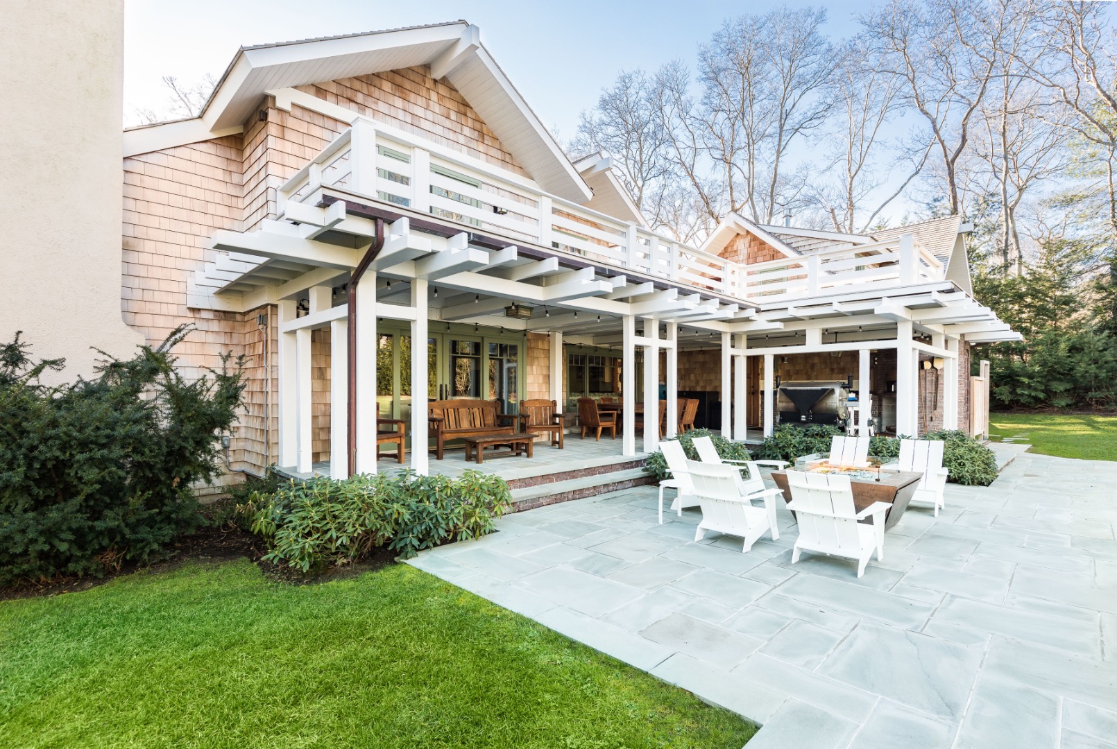 30 East Hollow Road East Hampton, NY 11937 - Photo 2 of 29 a view of a house with backyard porch and sitting area