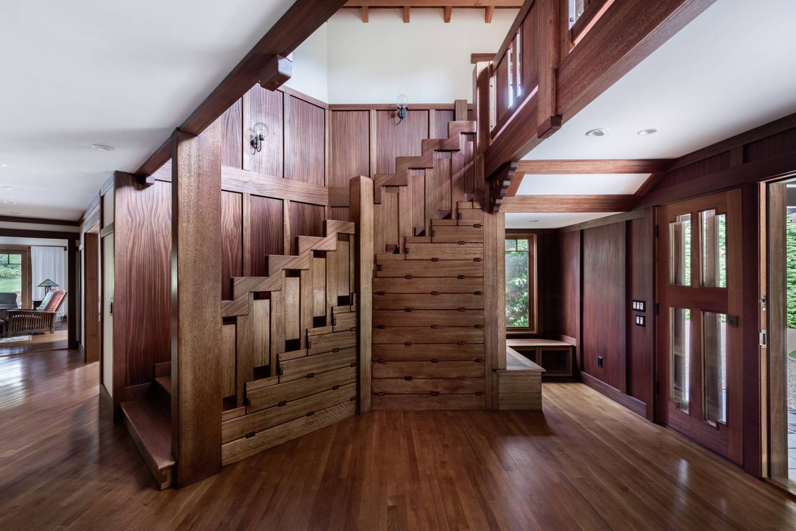 30 East Hollow Road East Hampton, NY 11937 - Photo 12 of 29 a view of a hallway with wooden floors and stairs