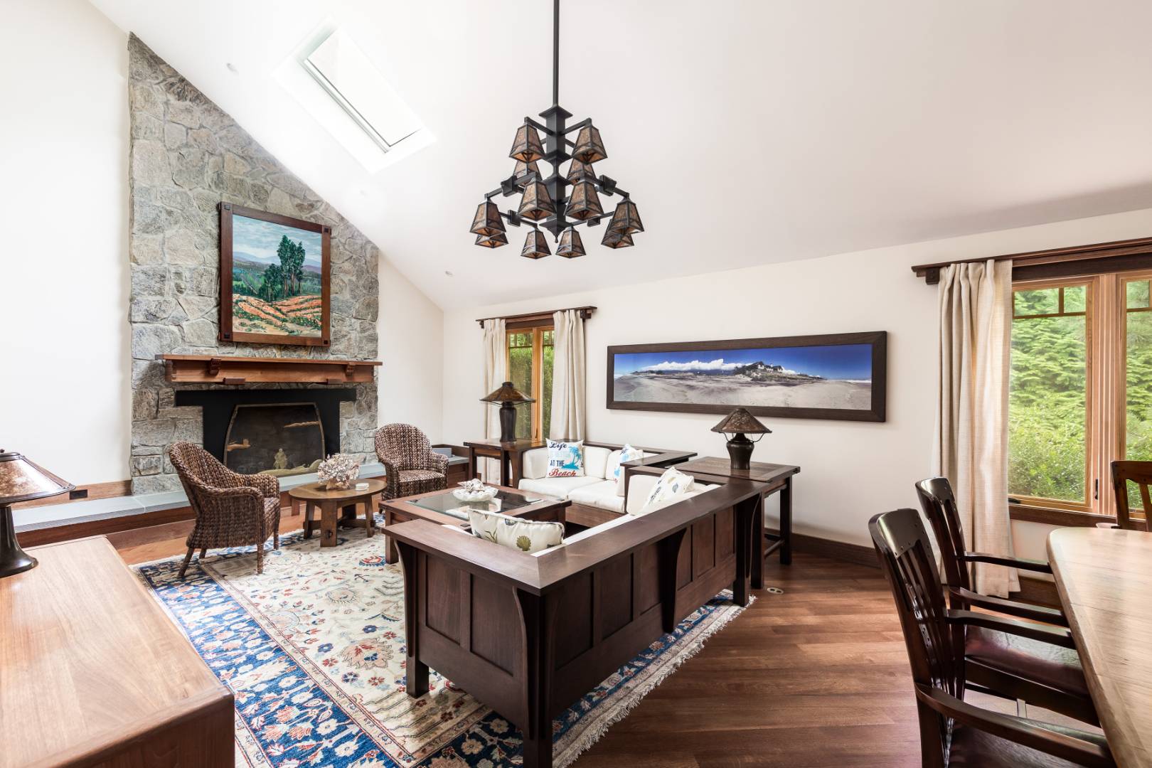 30 East Hollow Road East Hampton, NY 11937 - Photo 6 of 29 a living room with furniture a window and a chandelier