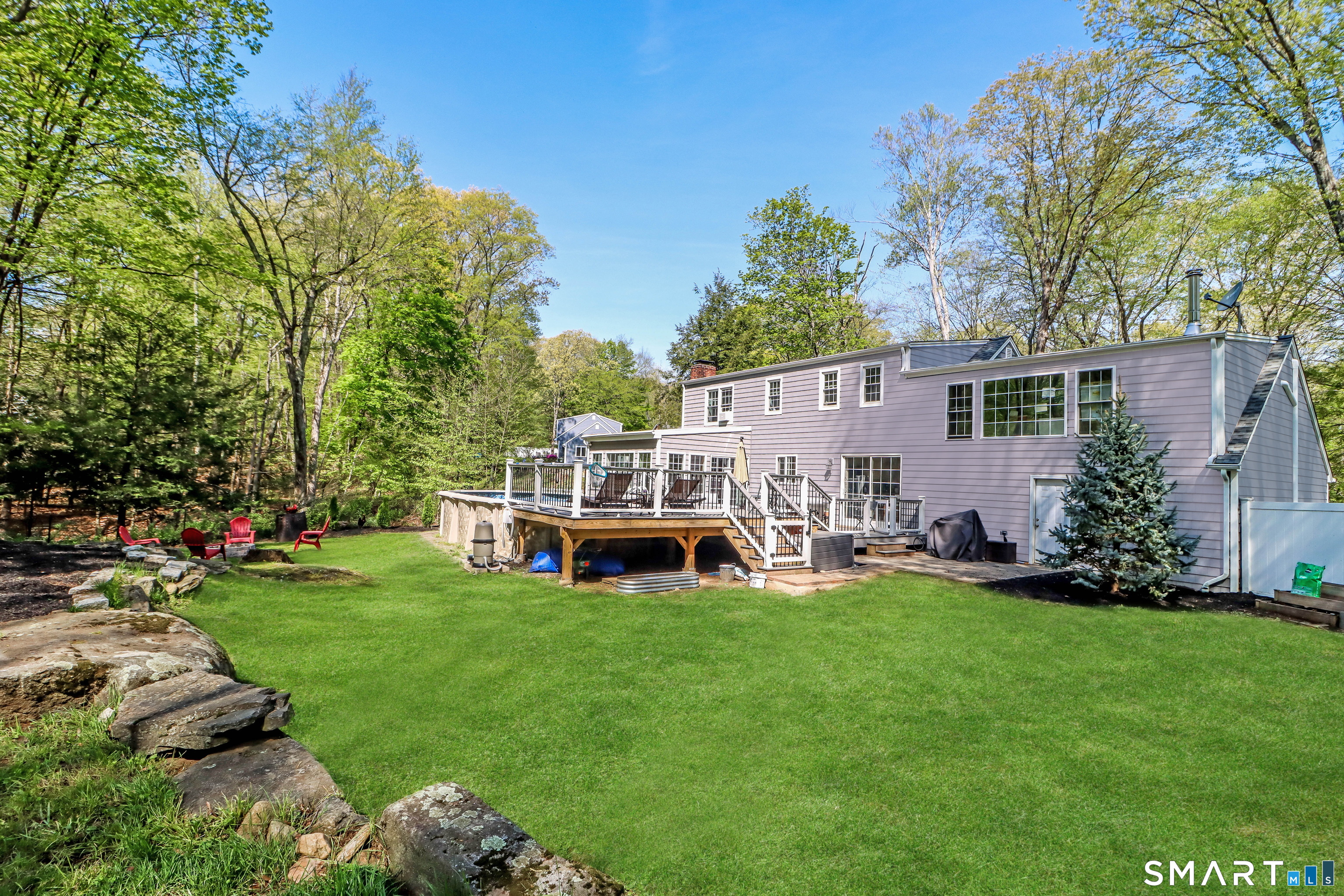 20 Puritan Valley Road Brookfield, CT 06804 - Photo 26 of 35 a view of a house with a yard and sitting area