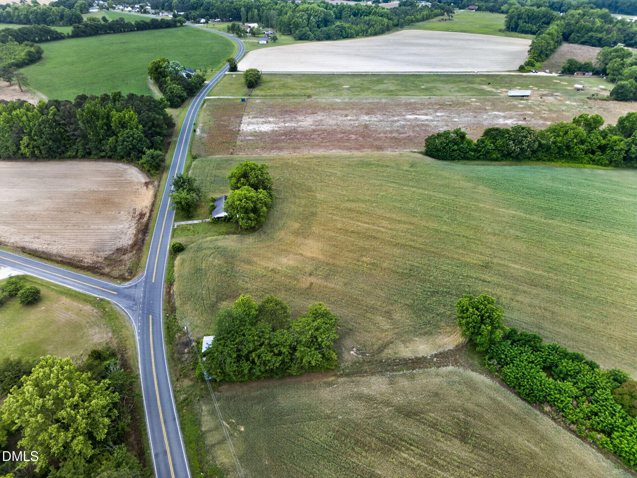 1651 Live Oak Road Angier, NC 27501 - Photo 20 of 22 a view of a water pond with green field