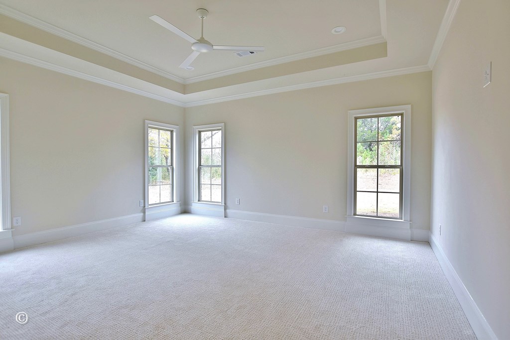 5905 Linley Court Midland, GA 31820 - Photo 16 of 41 a view of a big room with windows and chandelier fan