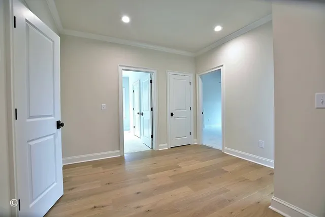 a view of an empty room with a fireplace and garden