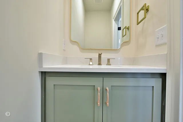 a sink with a mirror