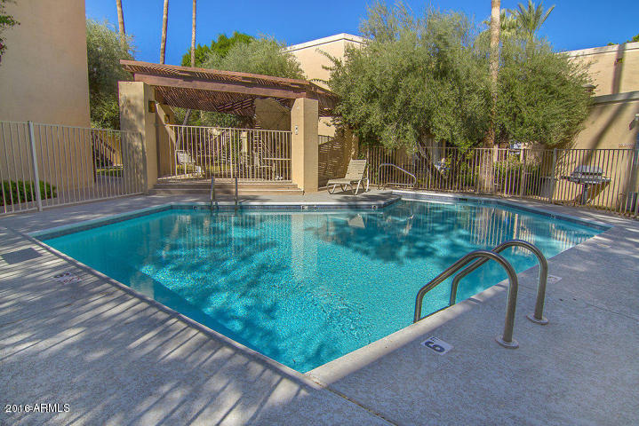 6236 North 16th Street, Unit 19 Phoenix, AZ 85016 - Photo 16 of 18 a swimming pool with outdoor seating